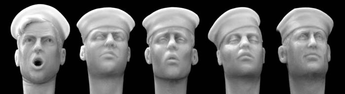 Heads wearing USN style white sailor caps