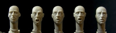 5 heads with frightened and anxious expresions