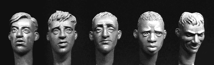 5 heads with hair, 1 African, 4 Europeans